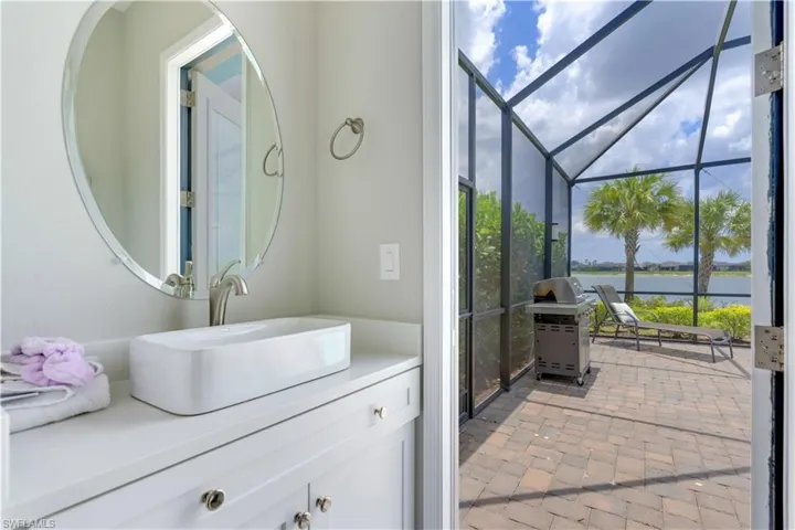 Bathroom featuring a water view and vanity