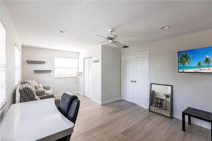 Office featuring light wood-style floors, recessed lighting, and ceiling fan