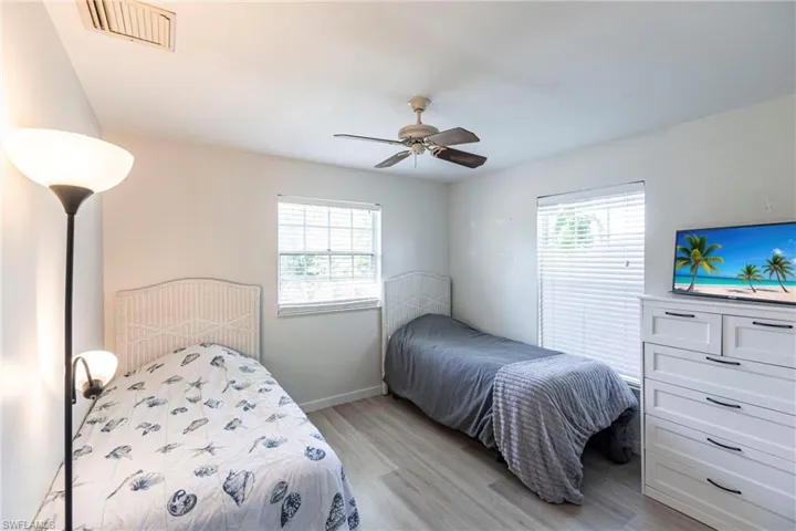 Bedroom featuring light wood-style floors and ceiling fan