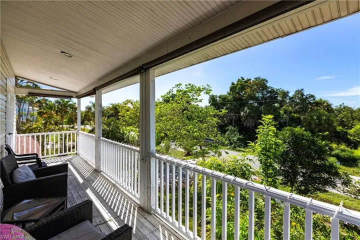 Porch featuring a sunroom
