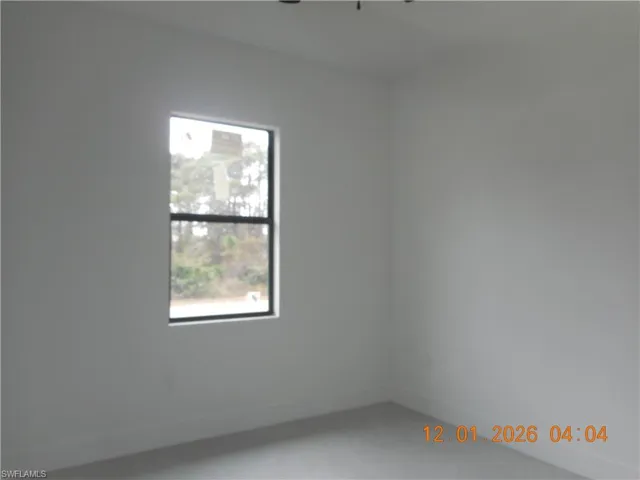 Spare room with baseboards