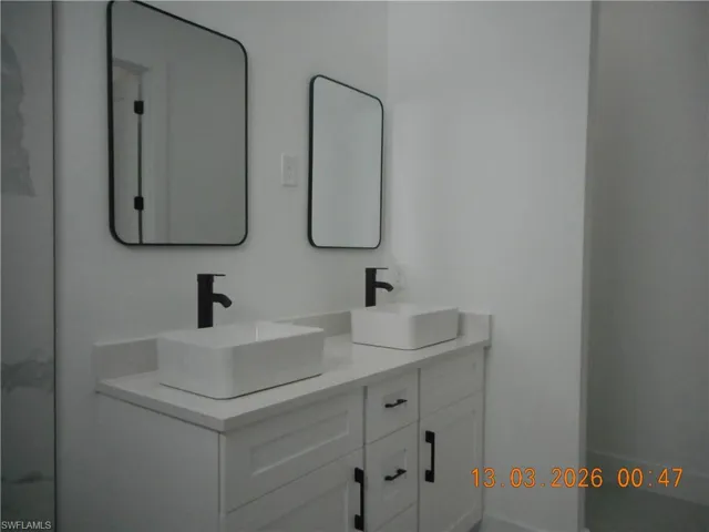 Full bath with double vanity