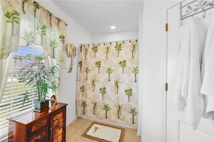 Bathroom featuring tile floors