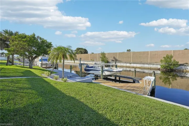 Concrete Dock with Wood Decking Captain's Walk & Lift