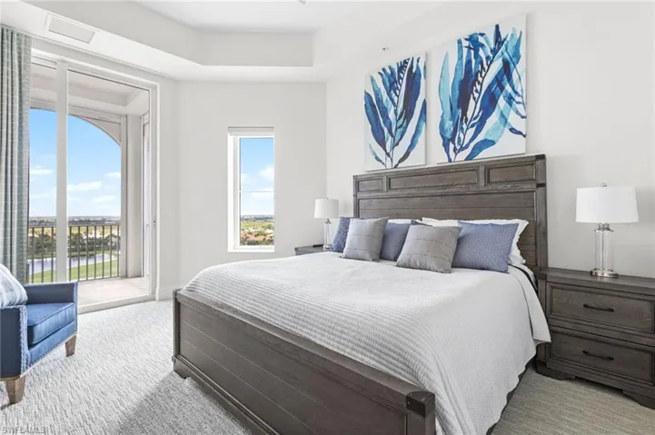 2nd bedroom has access to the back lanai with views of the lakes and golf course!