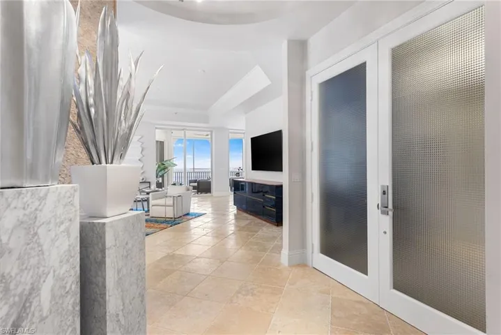 Frosted glass entry double doors to your penthouse!