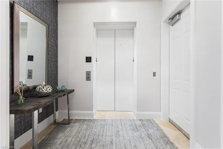Foyer and elevator to the penthouse.