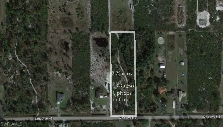 Aerial overview of property's location featuring property parcel outlined