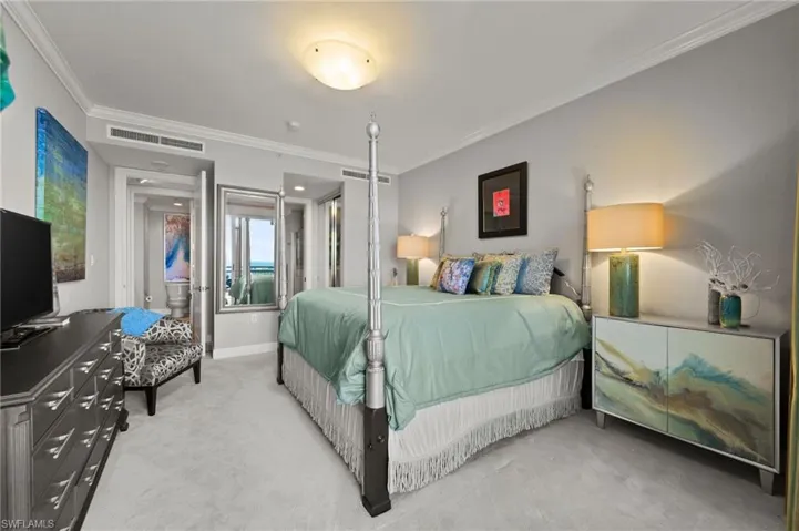 Spacious guest bedroom ensuite, located on opposite side of home from primary suite.