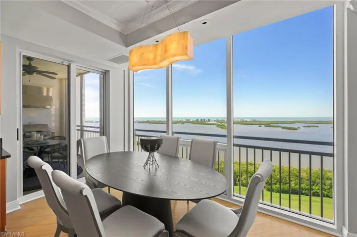 Dining room with access to patio and grill.