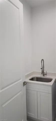 Laundry room with sink