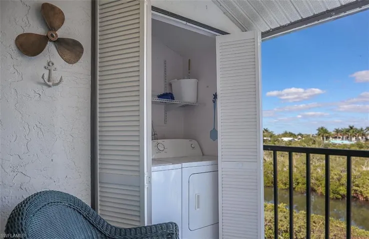 Laundry area featuring laundry area and independent washer and dryer