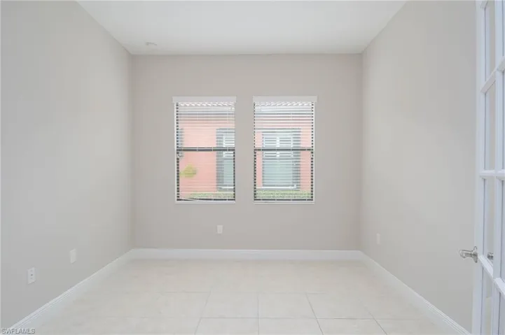 View of tiled spare room