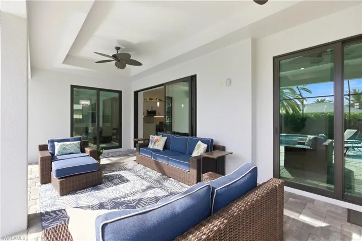 View of patio / terrace with a ceiling fan and an outdoor hangout area