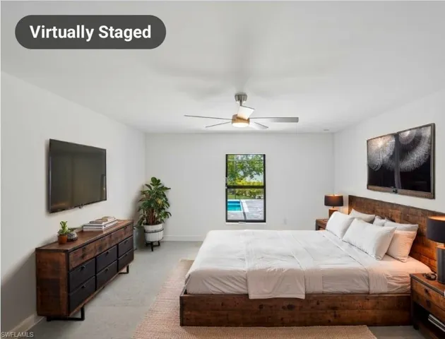Bright room featuring light-toned walls and polished concrete flooring