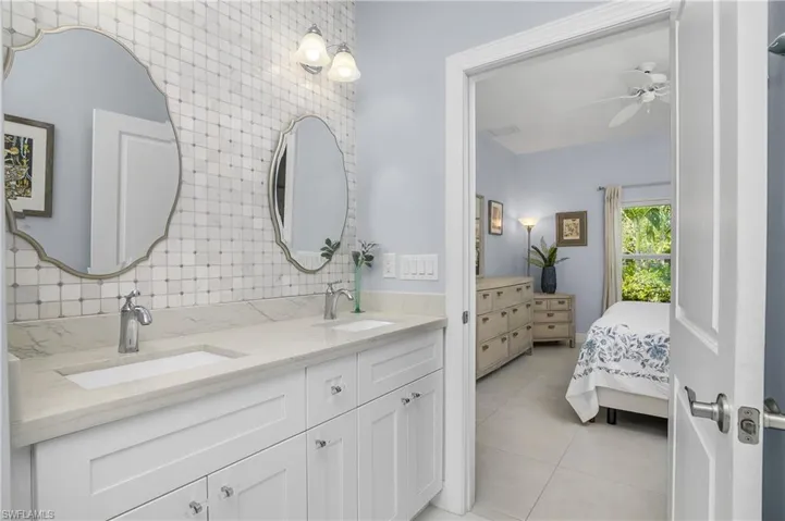 Dual vanity with tasteful backsplash