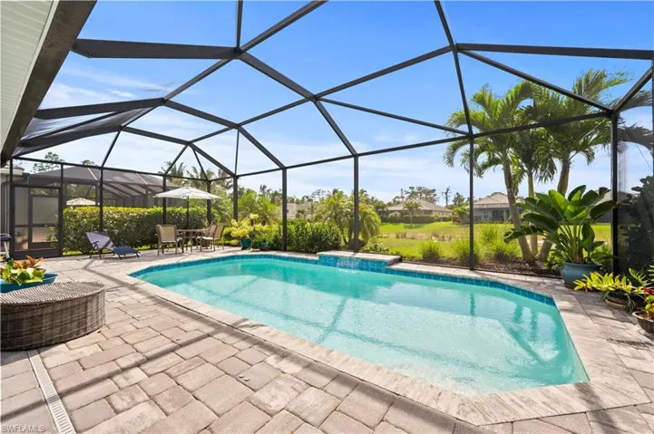 Pool featuring a lanai and a patio