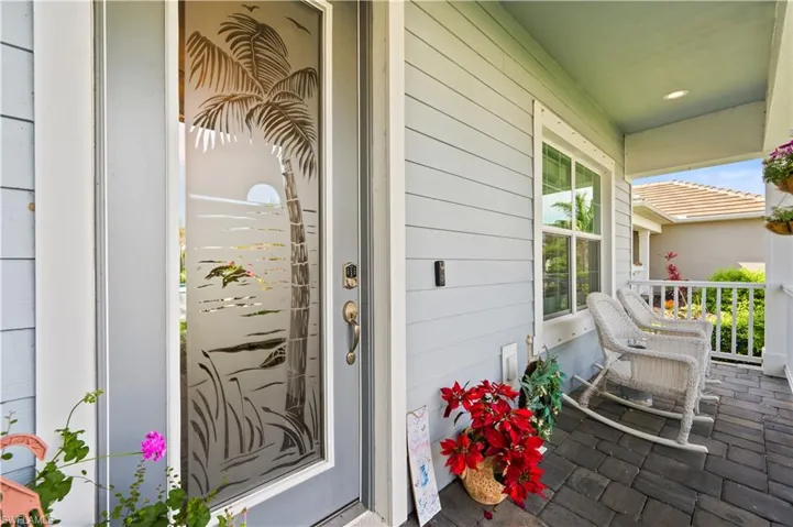 Doorway to property with a porch