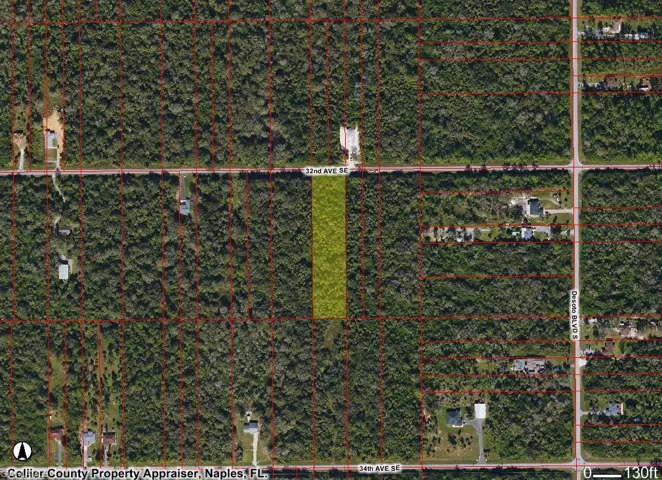 Aerial view of property's location featuring property parcel outlined