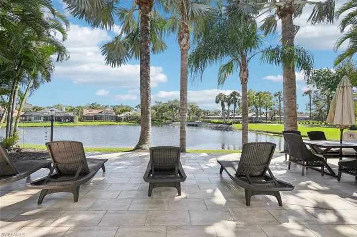 View of patio / terrace with a water view