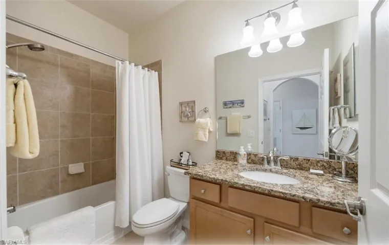 2nd Bathroom with shower / tub combo and vanity
