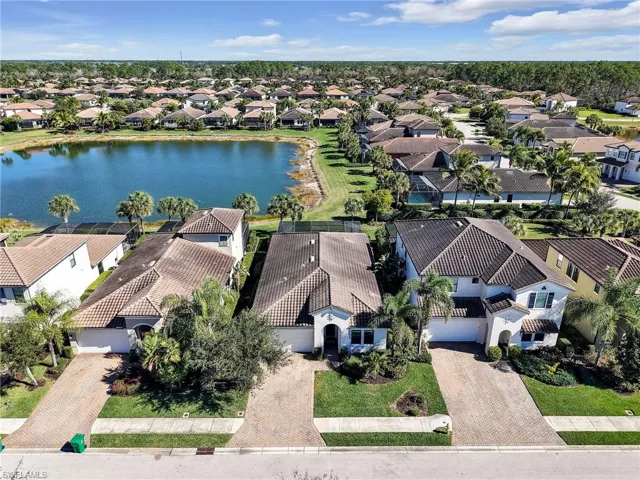 Aerial view of residential area with a nearby body of water