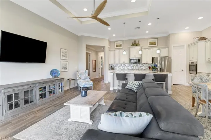 This open concept floorplan with side-by-side living room and dining room.