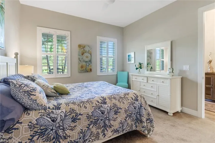 Guest bedroom is bright and comfortable.