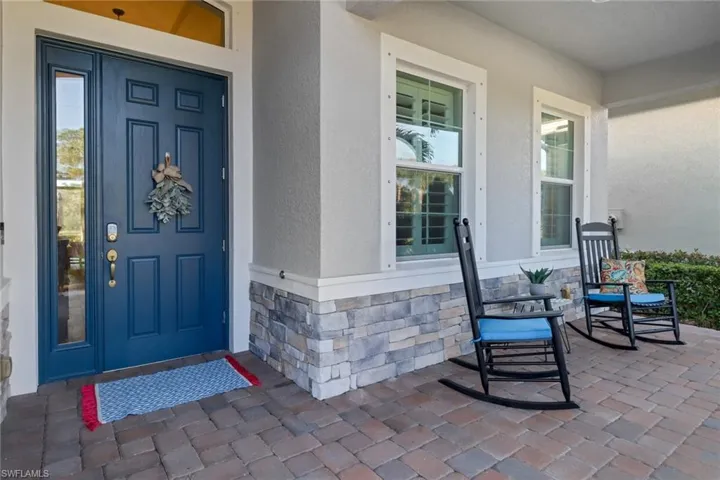 Front entry featuring beautiful stonework.