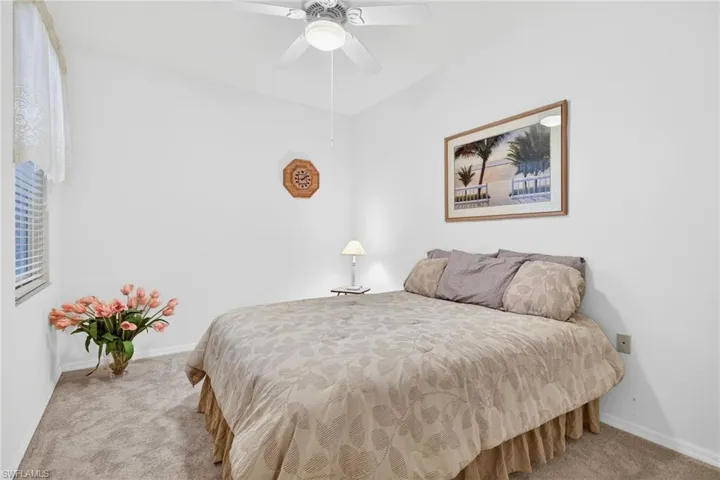 Bedroom with carpet floors and ceiling fan