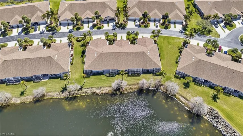 Aerial view of property's location featuring nearby suburban area