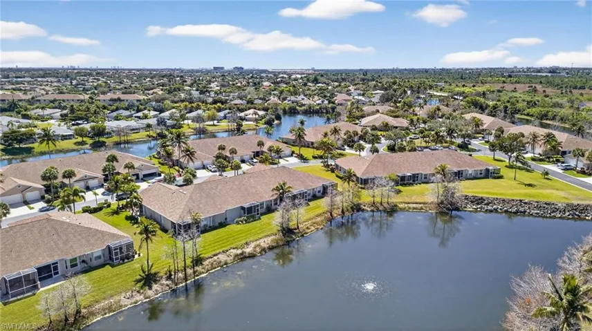 Aerial view of residential area with a large body of water