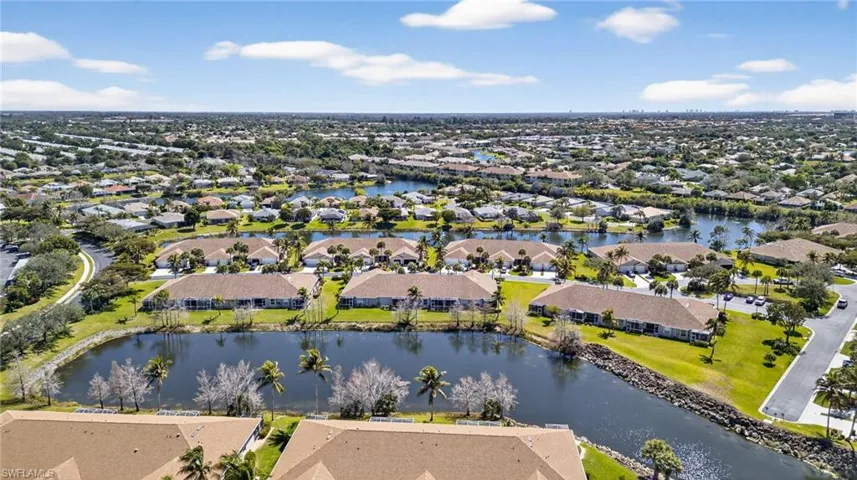 Aerial view of residential area with a nearby body of water