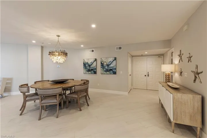Dining space featuring an inviting chandelier
