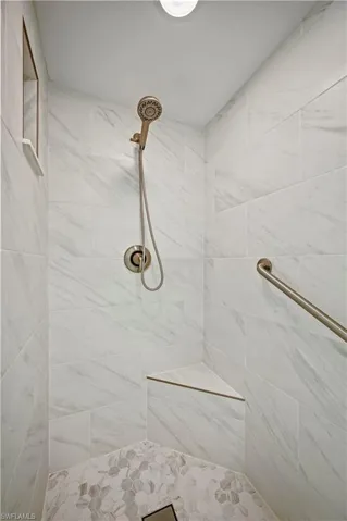 Bathroom with a tile shower