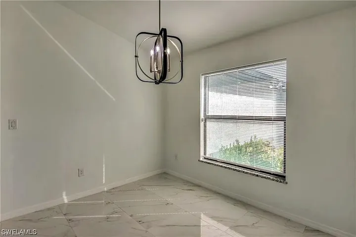 Modern ceiling light fixture with a geometric frame