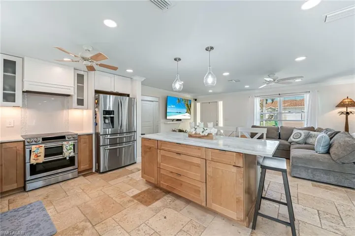 Stainless Steel appliances, under cabinet lighting in the beautiful kitchen
