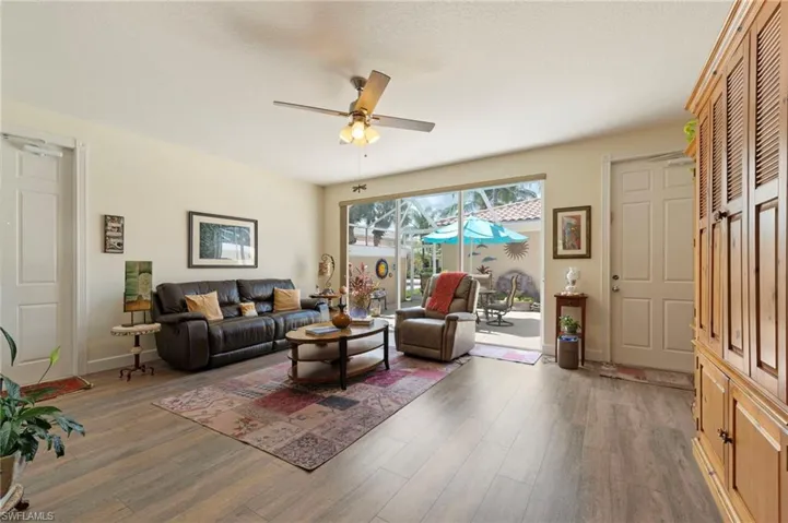 5361 Laughing Gull Ln. Bonita Springs FL 34135 - Living area has slider access to patio