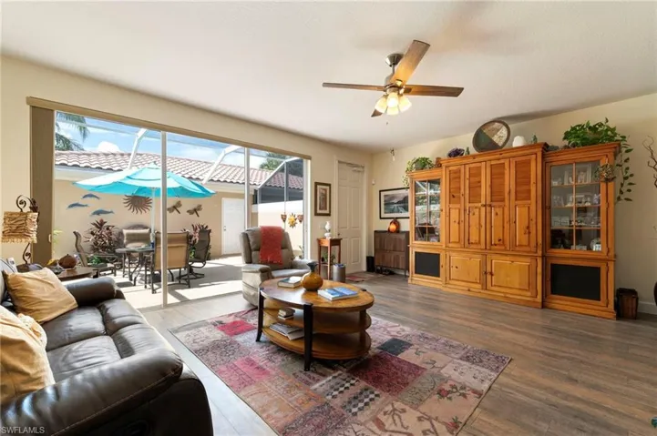 15361 Laughing Gull Ln. Bonita Springs FL 34135 - Living area with vinyl plank flooring