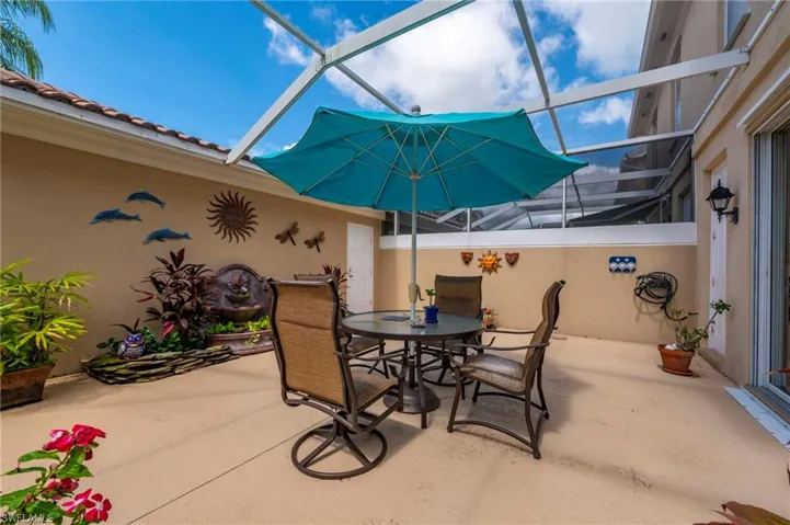 15361 Laughing Gull Ln. Bonita Springs FL 34135 - Screened patio courtyard area with water feature