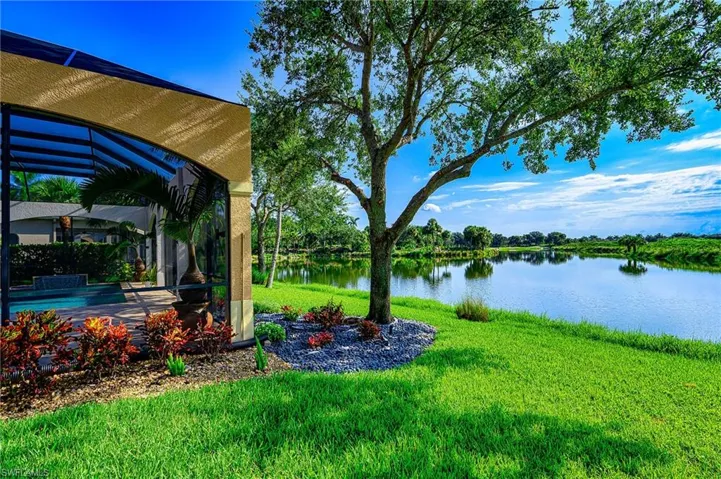 View of yard with a water view