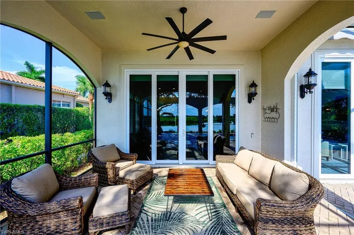 Sunroom featuring ceiling fan