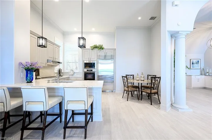 Kitchen featuring quartz countertops, stainless steel appliances