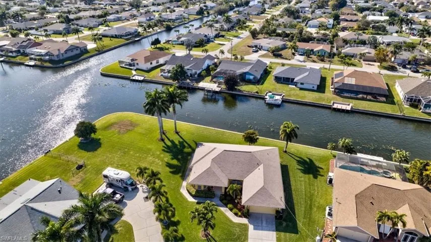 Aerial view of residential area with a large body of water