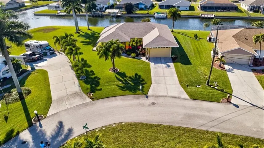 Aerial view of residential area with a nearby body of water
