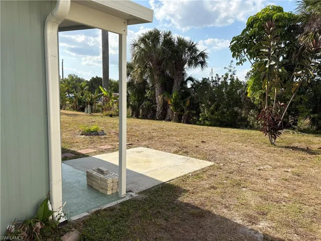 View of yard with a patio