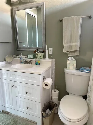 Bathroom with toilet and vanity