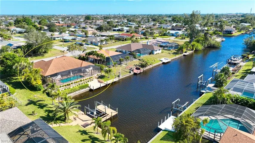 Aerial view of residential area with a nearby body of water
