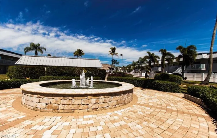 View of home's community water fountain