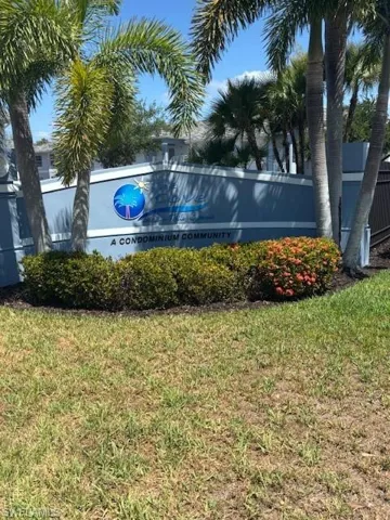 Community sign featuring a yard
